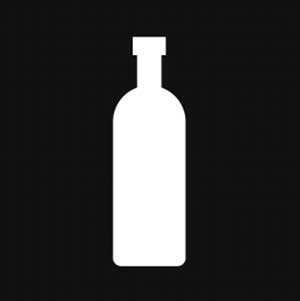 A black background with a white bottle in the front
